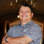 Headshot of Rutgers Turf Alumnus Douglas Gonzales